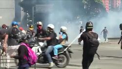 CLEAN : Protest march affected by police firing tear gas in Caracas News Clip
