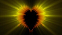 Golden rays of light radiate from a beating red and black heart. Stock Footage