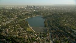 Aerial view of Los Angeles at the Silverlake neighborhood with the skyscrapers of downtown in the distance. Stock Footage