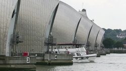 The Thames barrier on the River Thames in London. It was constructed to protect the capital city from storm surge flooding. Recent predictions show it will probably be redundant in around twenty years due to increased stormy weather and sea level rise driv Stock Footage