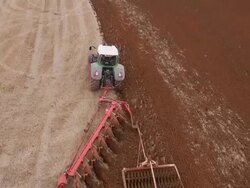 Aerial view of Tractor Ploughing Stock Footage