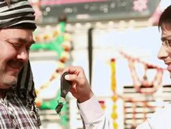 Salesman giving keys to a truck driver, Ballabgarh, Haryana, India Stock Footage