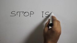 Hand writing a 'stop isis every where' message on a white board using a black marker Stock Footage