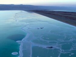 AERIAL MS CU DS View of salt crystals in dead sea / Sourn Judea Desert, Israel   Stock Footage