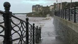 Waves brake in Storm Brian News Clip