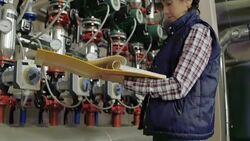 Female stationary engeneer at work Stock Footage