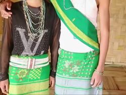 MS TU Shot of Naga tribes couple in traditional outfit during Hornbill Festival, Kisama / Kohima, Nagaland, India Stock Footage