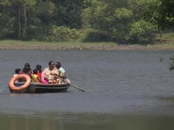 Pan Right Shot Boat in Pookot Lake Kerala India Stock Footage