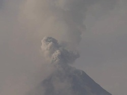 Ash explodes from the crater of an active volcano, Philippines, Dec 2009 Stock Footage