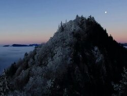 frozen winter landscape covered in fog from dawn to sunrise Stock Footage