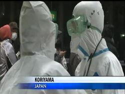 People fearing radiation exposure from a series of nuclear accidents on the northeastern Japan coast in the aftermath of Friday's earthquakes and tsunami line up to be tested at a gymnasium in the city of Koriyama. News Clip
