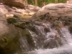 HD 1080i Soft Water flowing over Rocks Stock Footage