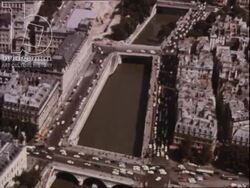 The Bateaux Mouches travels down the Seine with accordion band on board. Paris, 1970s. Stock Footage