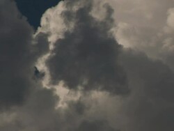 MS Shot of scud cloud drifts by towering cumulus / Oklahoma, United States Stock Footage