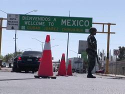 April 9 2009 WS LA Mexican Soldier watching cars passing by at Mexican and US border, Juarez, Chihuahua, Mexico, AUDIO Stock Footage