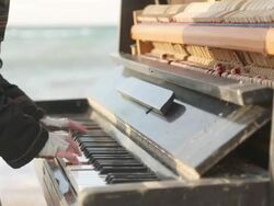 playing the old piano Stock Footage