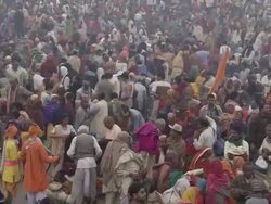 WS PAN Ganga Mela festival people crowding on river bank / India Stock Footage