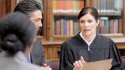 Judge and lawyers talking in meeting Stock Footage