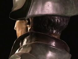 A bust of Napoleon Bonaparte rotates against a black background. Stock Footage