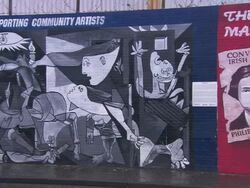 Pan of Political murals in Belfast, Northern Ireland Stock Footage