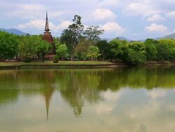 Temple with its reflection in Sukhothai historical park Thailand Stock Footage