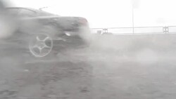 Car driving at rainy day - side view - 4K Stock Footage