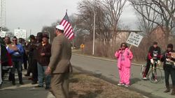 Ministers, civil rights proponents, union workers and others marched in support of a black motorist who was pulled from his car and repeatedly punched in the head by a white police officer during a traffic stop in suburban Detroit. (April 3)      Instructional Video