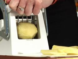 HD: Slicing Potato Stock Footage