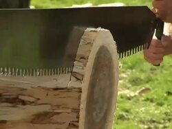 Big Saw cutting through wood Stock Footage