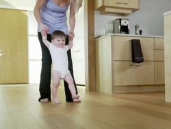 Mom walks with baby Stock Footage