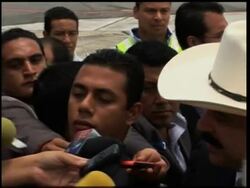 Ousted president received with head of state honours; pro-Zelaya march News Clip