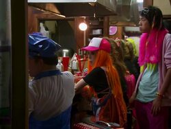 MS Group of young trendily dressed people eating, laughing, having fun in small restaurant / Tokyo, Japan Stock Footage