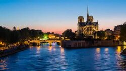 Notre Dame cathedral and the River Seine, Paris, France, Europe - Time lapse Stock Footage