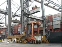 APL containers being moved, Container Terminal, Southampton, UK Stock Footage