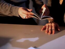 Art forger and artist looking at forged documents, close-up Stock Footage