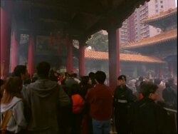 People praying inside the Wong Tai Sin Temple, Chinese new year, Wong Tai Sin Temple, Hong Kong Stock Footage