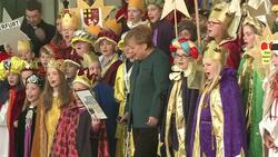 CLEAN : Merkel makes first appearance on crutches News Clip