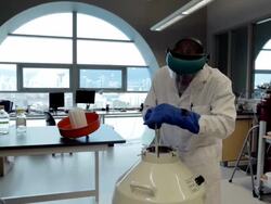MS PAN Lab technician taking samples out of liquid nitrogen at Cancer research Healthcare medicine  Industry DNA sequencing Laboratory / Vancouver, BC, Canada    Stock Footage