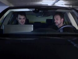 Hero and henchman meeting secretly in a car, the exchange Stock Footage