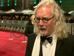 INTERVIEW - Billy Connolly on being at the awards, who he thinks will win at EE British Academy Film Awards 2013 Red Carpet Arrivals Stock Footage
