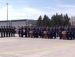 MH17 Kharkiv Airport repatriation ceremony News Clip