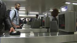 Commuters Passing Through Ticket Barriers News Clip