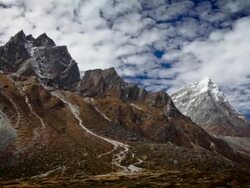 Time-lapse of rocky Himalayan peaks and passing clouds. Stock Footage