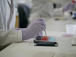 Close up, laboratory technician conducts modern scientific testing with colorful solutions Stock Footage