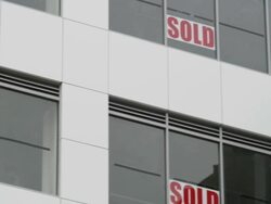 CU PAN Sold out signs on unfinished office building in Hay street city center / Perth, Western Australia, Australia Stock Footage