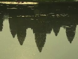 Pull Back Shot Water to Angkor Wat Siem Reap Cambodia Stock Footage