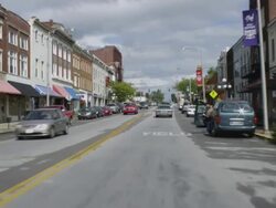 WS POV View of car driving through small town / Winchester, Kentucky, United States Stock Footage