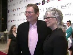 Fred Schepisi and his wife attend the 'Words and Pictures' Red Carpet at Madinat Jumeirah Stock Footage