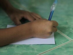 Children hand writing Stock Footage