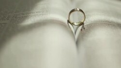 Rings on the Bible - Stock Footage Stock Footage